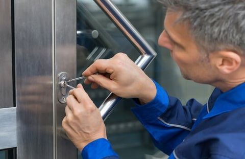 Man Repairing the Door — Lock Services in St Peters, MO