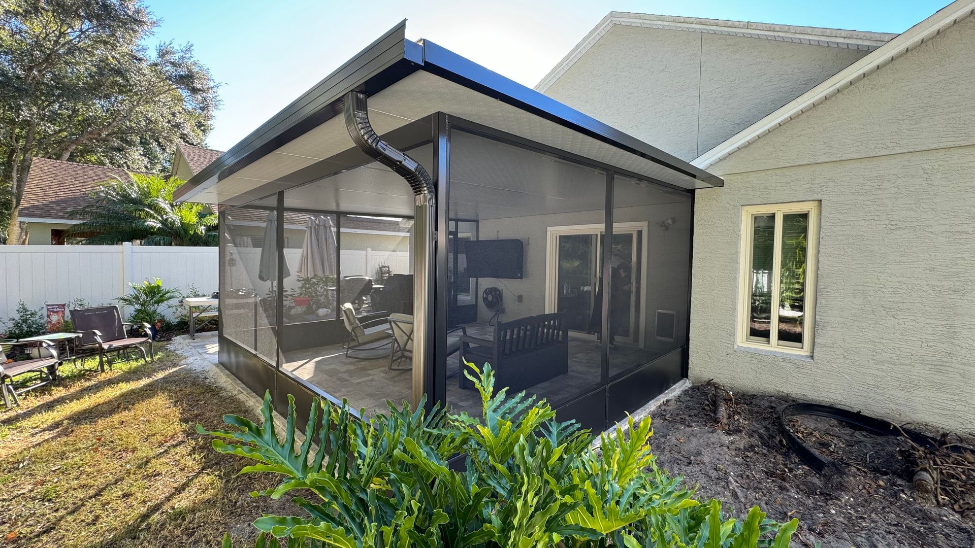 a swimming pool with a hot tub in the middle of it