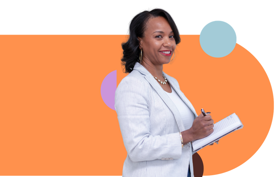 A woman in a white jacket is holding a notebook and a pen.