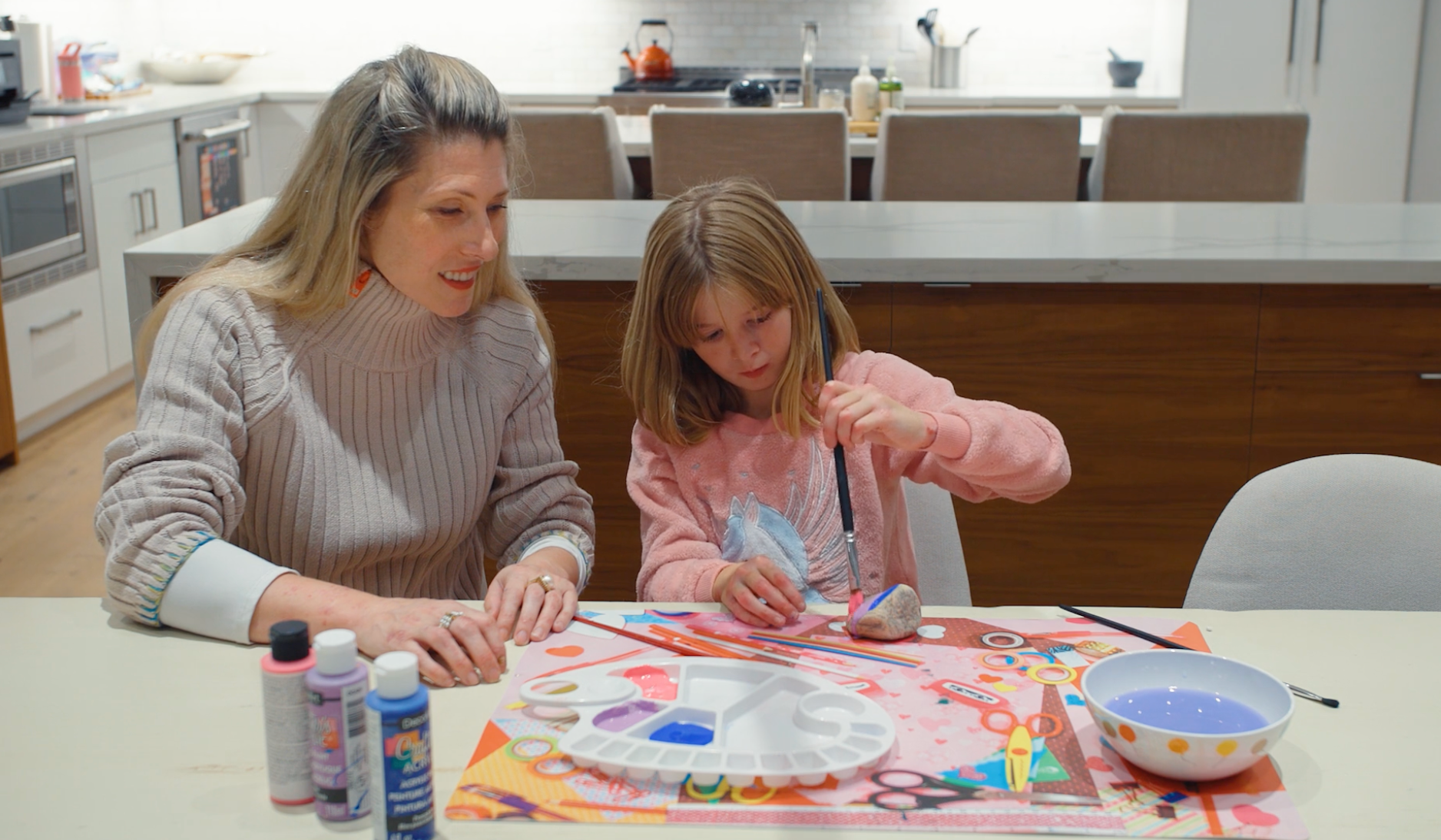 Mellissa and Mia painting rocks for Sophia's EB Hope to raise awareness about epidermolysis bullosa.