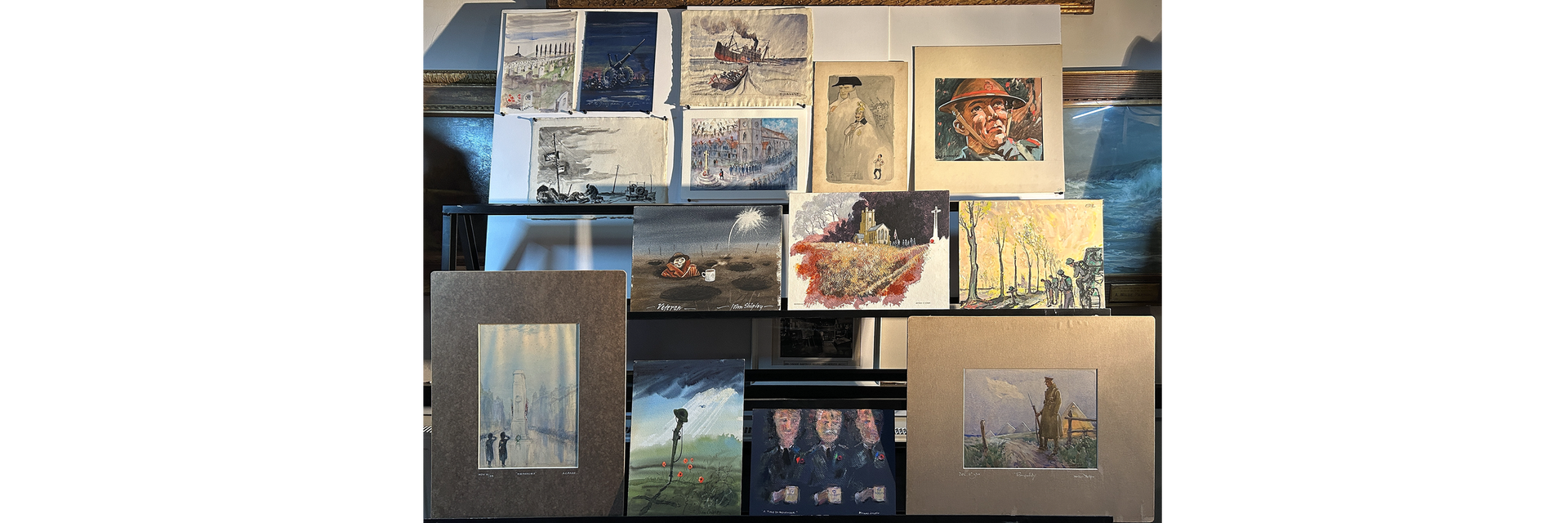 A panel of artwork done by member artists in the 1940's+ depicting themes from the world wars.