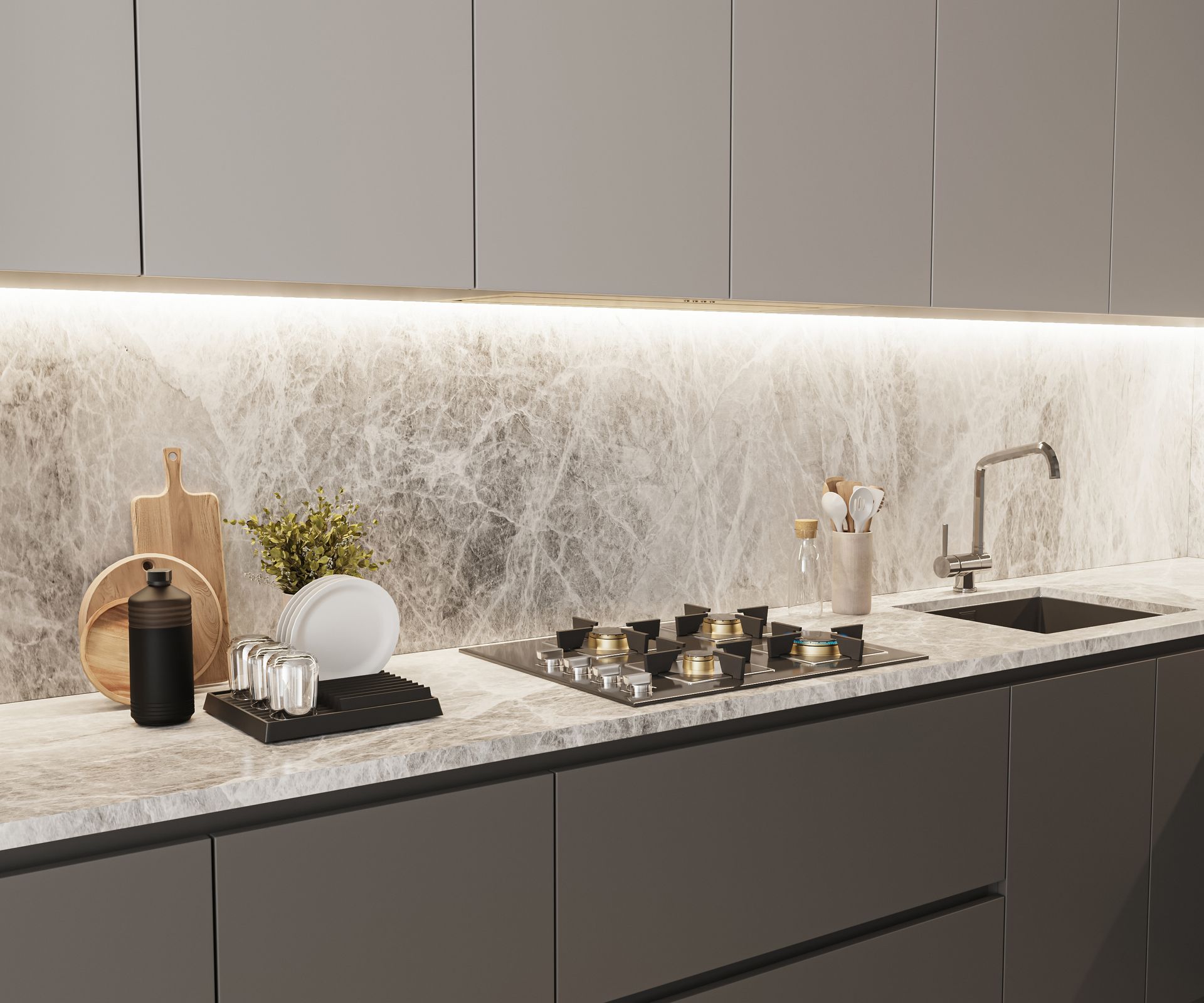 A kitchen with a stove top oven , sink , and cutting board.