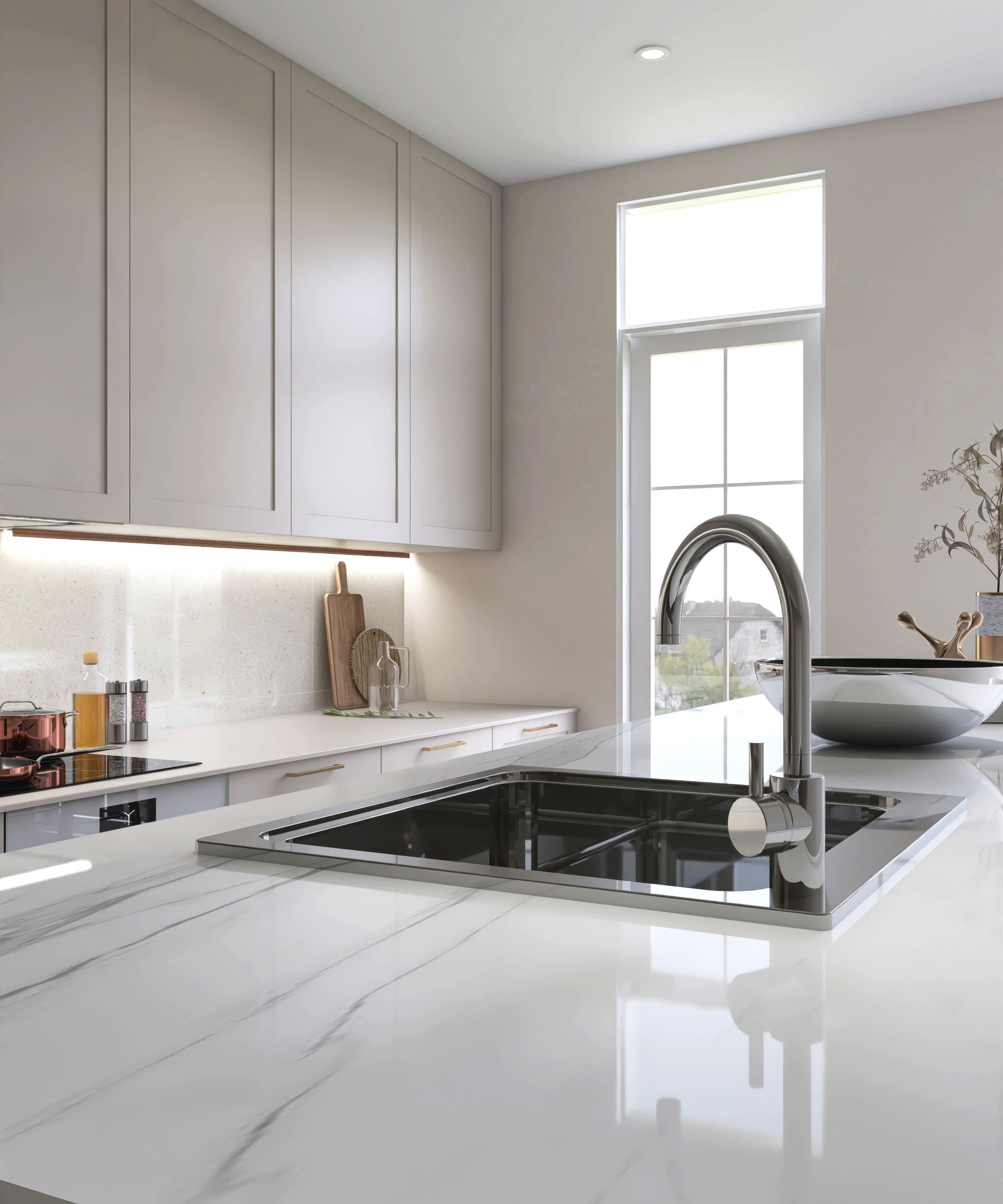A kitchen with a sink and a window.