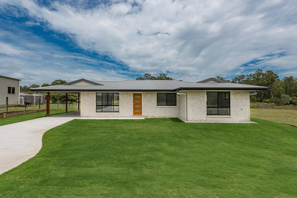 New Home with Neat Lawn — Country to Coast Homes in Logging Creek Rd, QLD