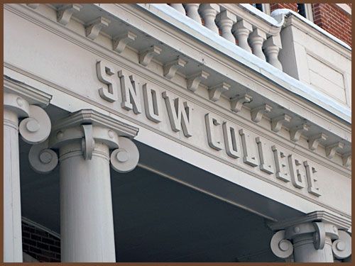 The name snow college is on the front of a building