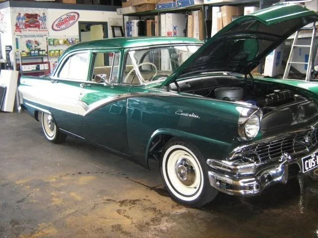 A Green and White Car With the Hood Open — Neilsen's Radiator Service in Toowoomba, QLD