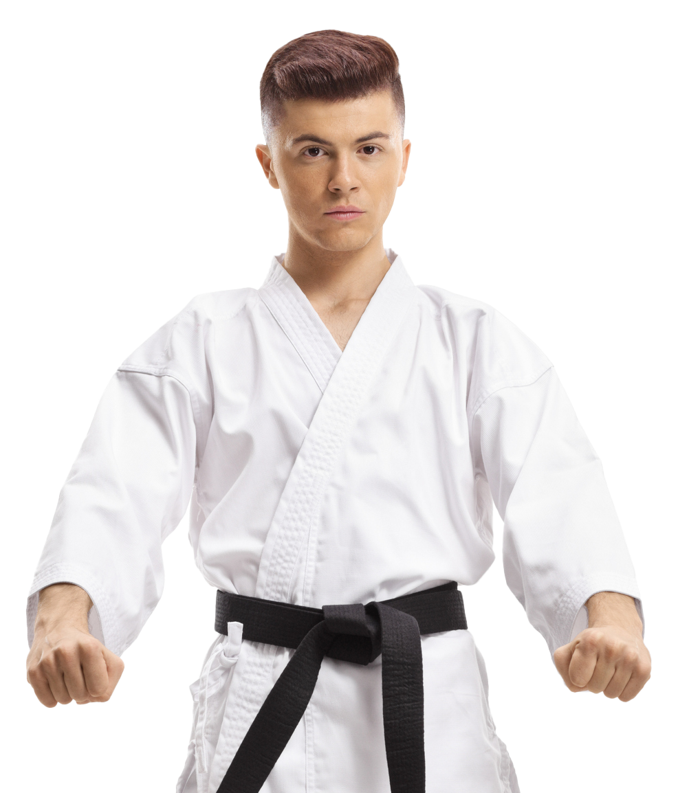 A young man in a white karate uniform with a black belt.