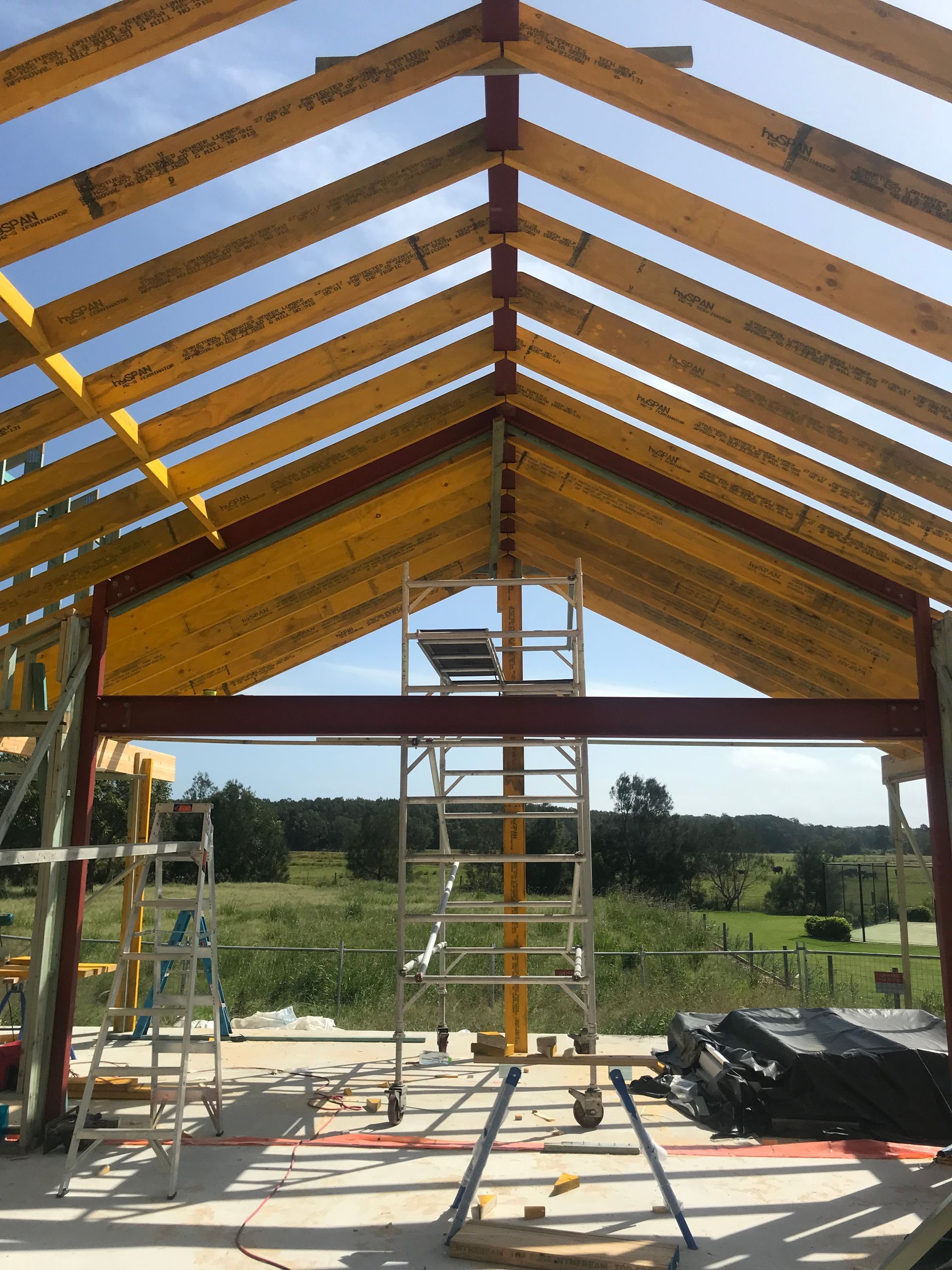 Construction of Building Framework With Wooden Beams — Keystone Property Solutions In Waratah, NSW