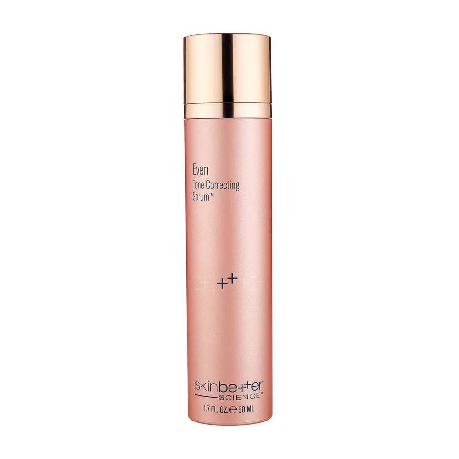 A pink bottle of skin better eye correcting serum