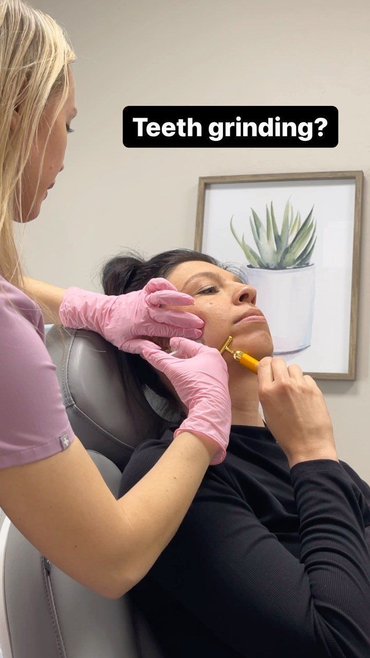 A woman is getting her teeth grinded by a dentist.