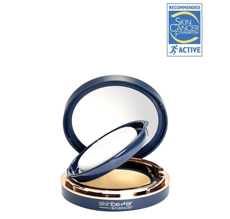 A compact powder with a mirror and the word active on it