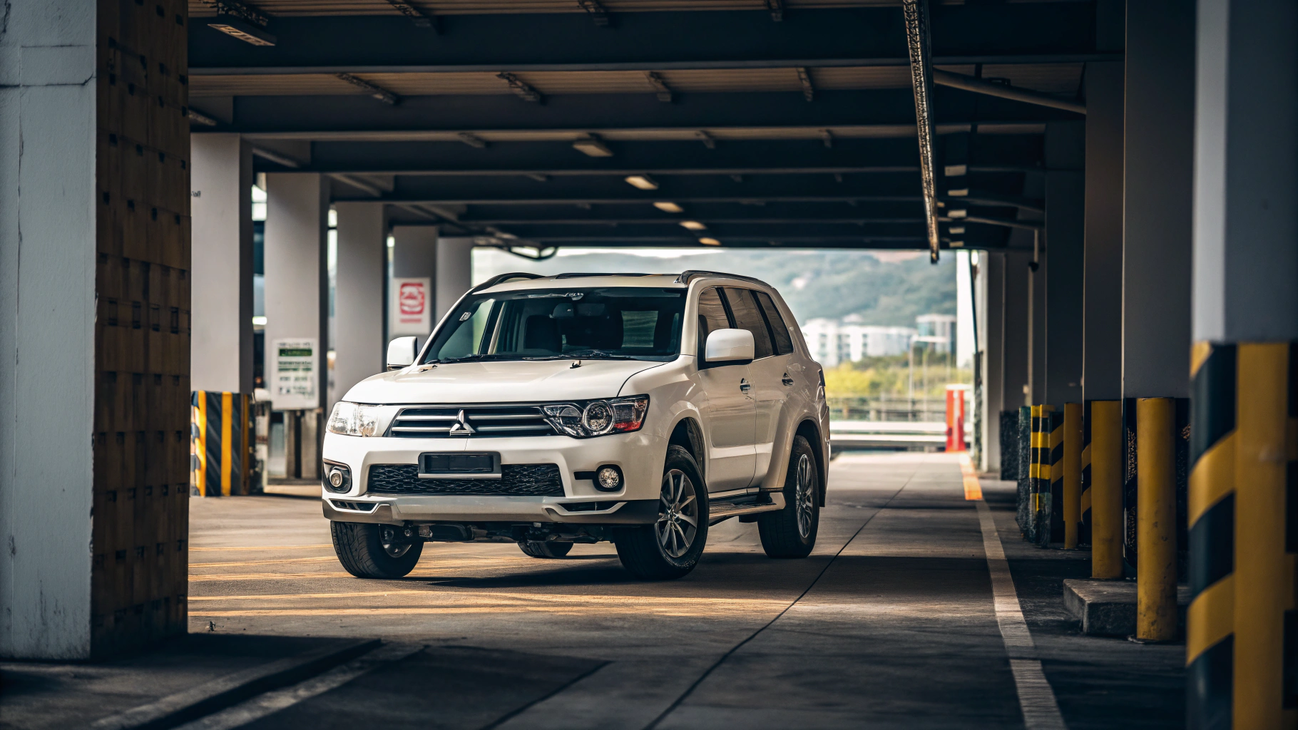 Mid-century modern credenza with a lamp and decorative objects, in a sunlit room.