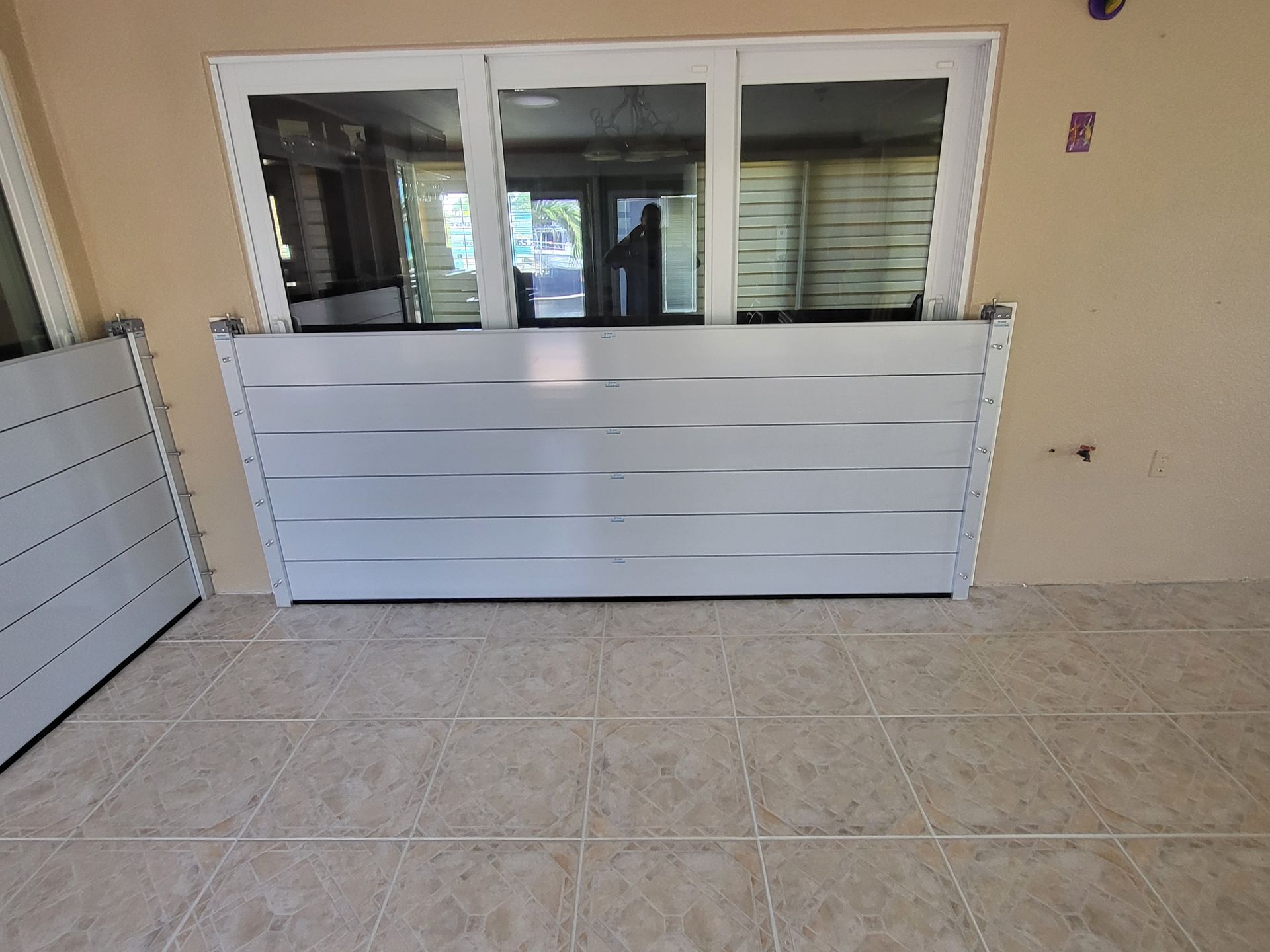 A room with a window and a flood barrier