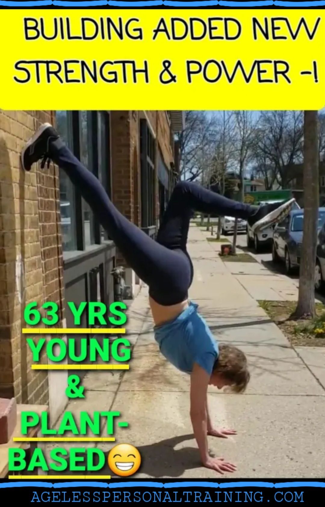 A person is doing a handstand on a sidewalk.