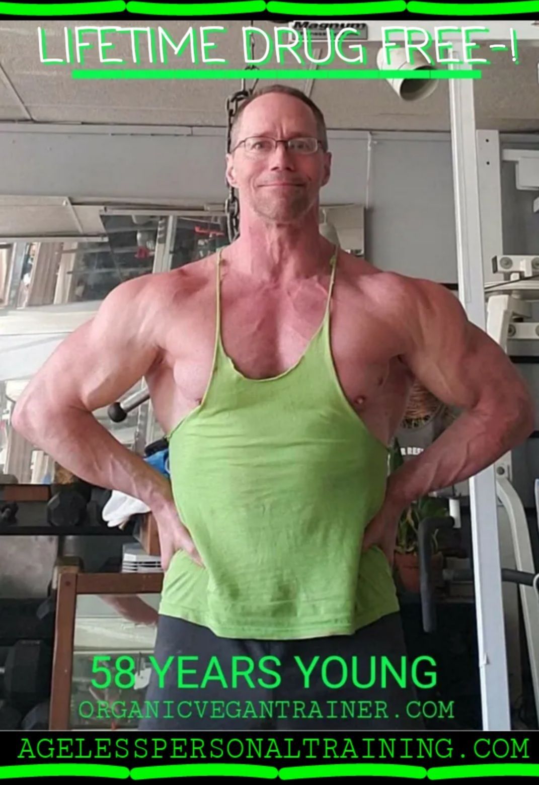 A man in a green tank top is standing in a gym with his hands on his hips.