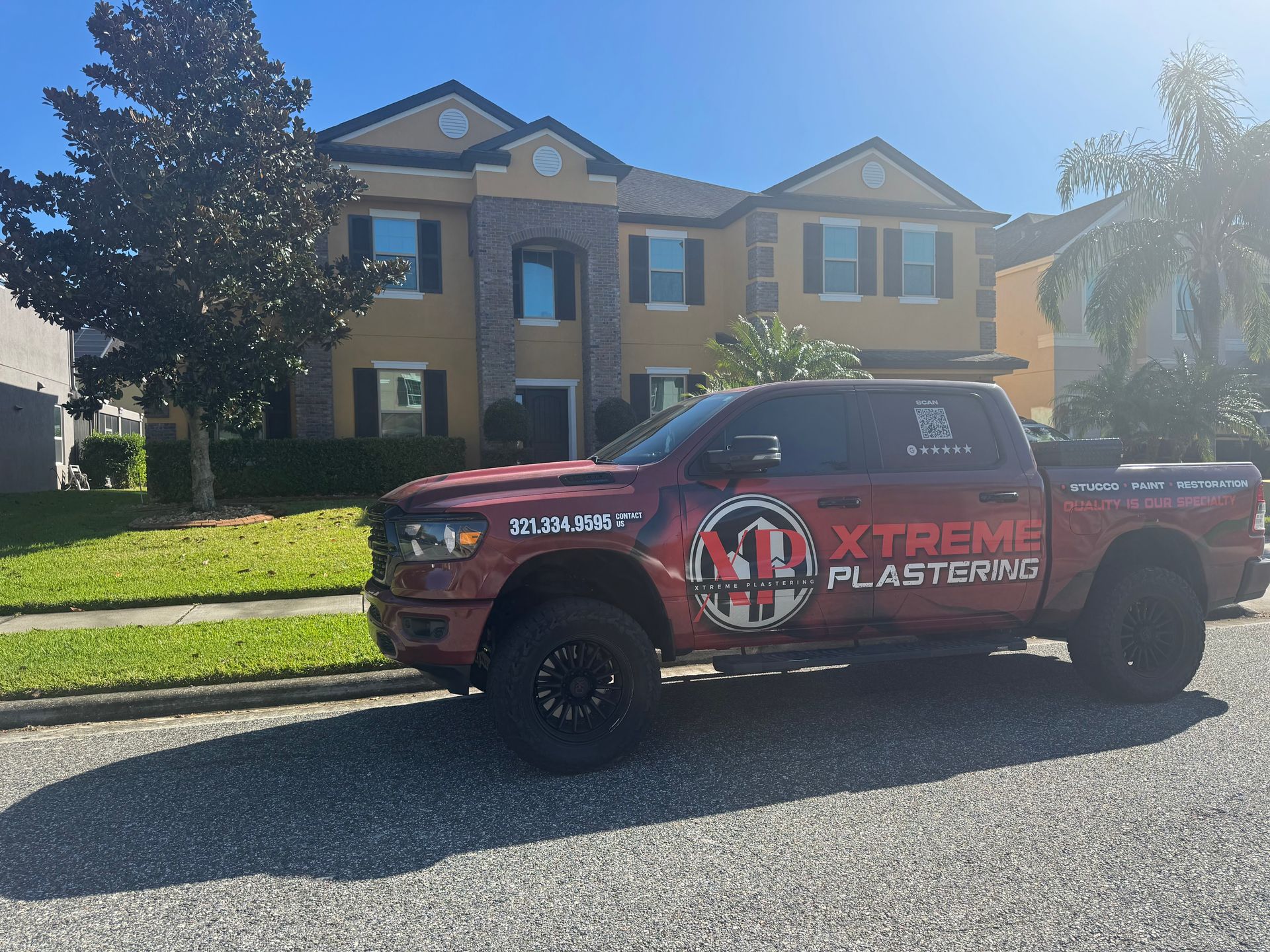 A red, lifted truck with 