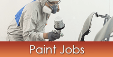 Person Painting Car Parts - Auto Body Repair Shop