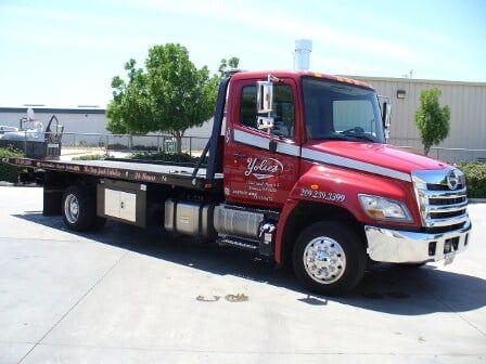 Red Tow Truck - towing services in Manteca, CA