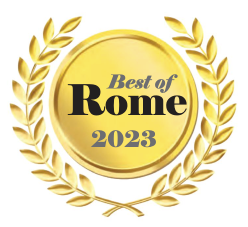 A gold medal with the words best of rome 2023 on it