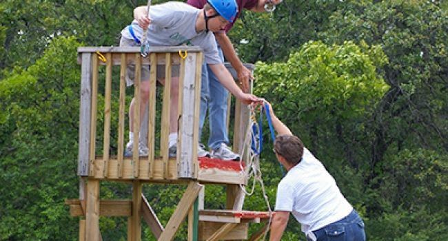 giving an helping hand at Camp Loughridge in Tulsa Oklahoma