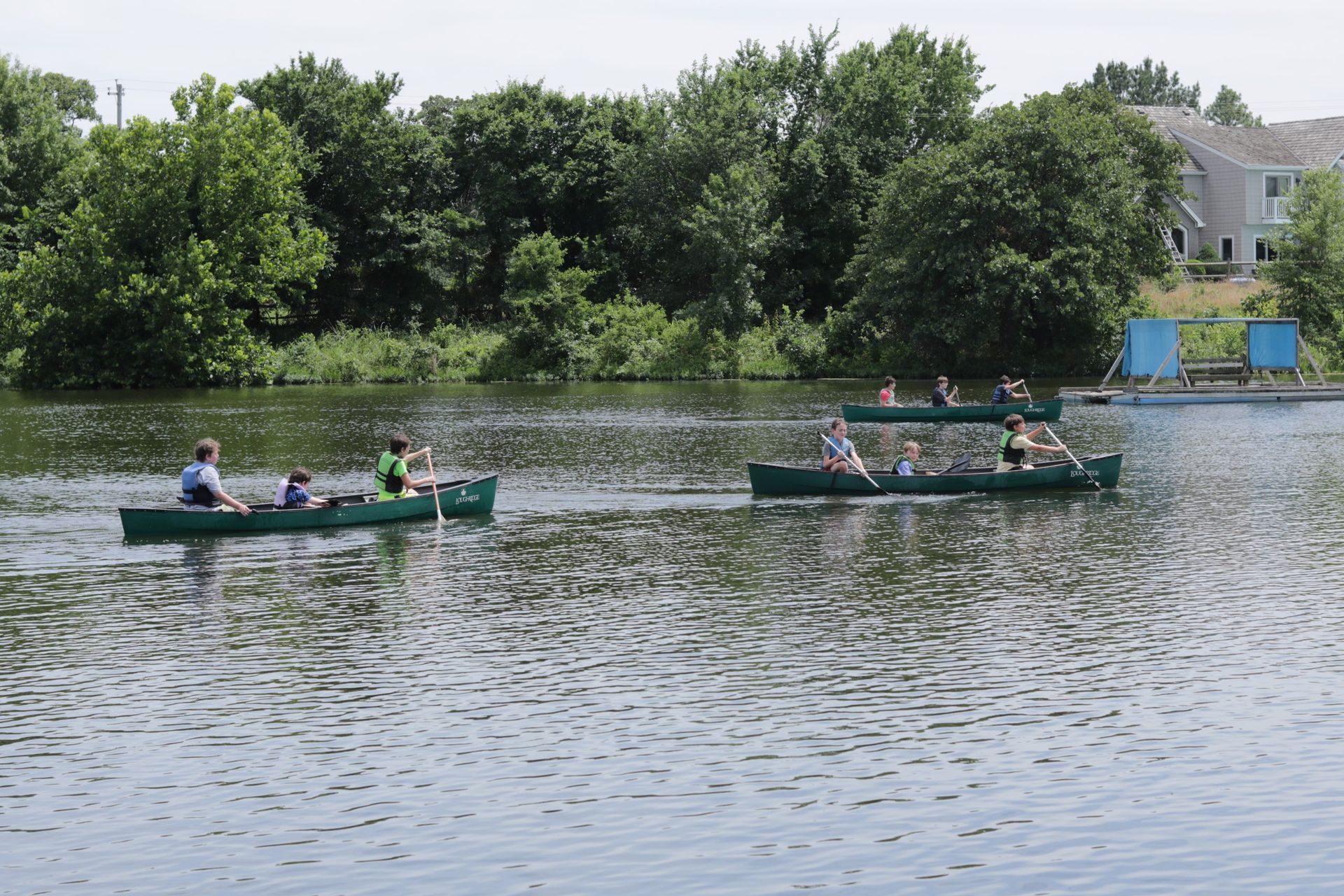 small boat on lake at Camp Loughridge in Tulsa Oklahoma