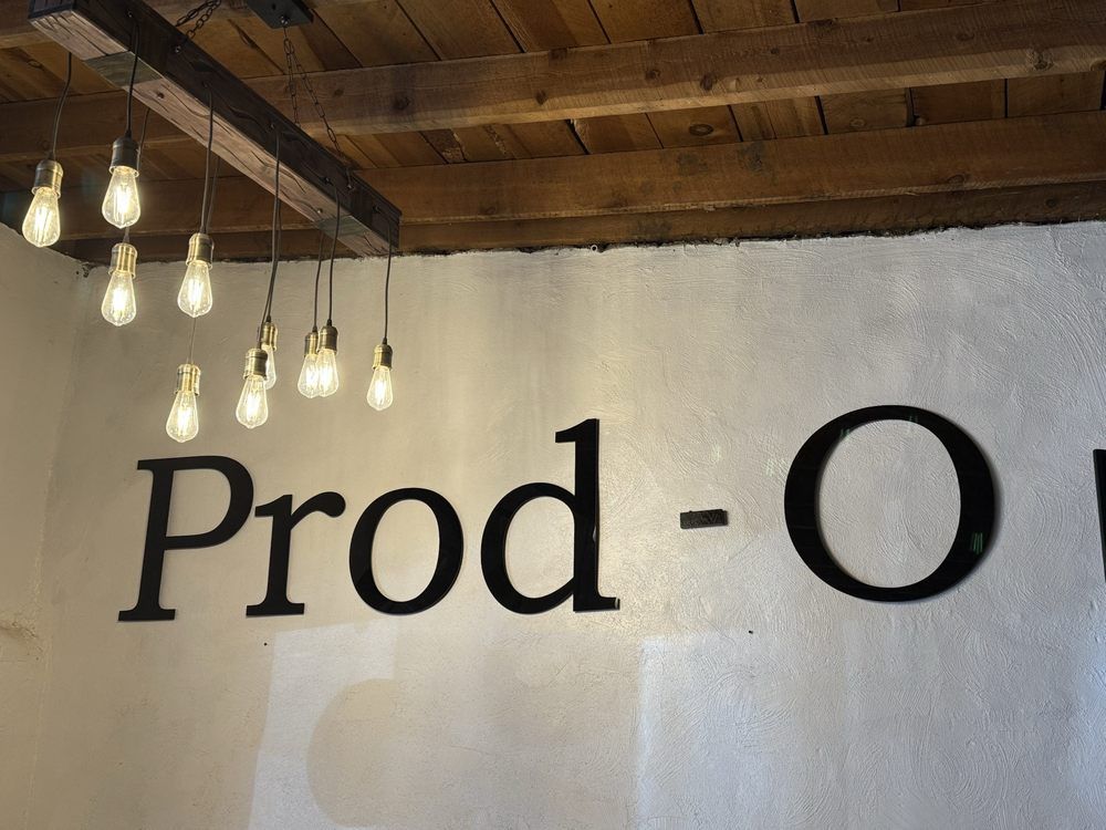 A white wall with the word prod written on it