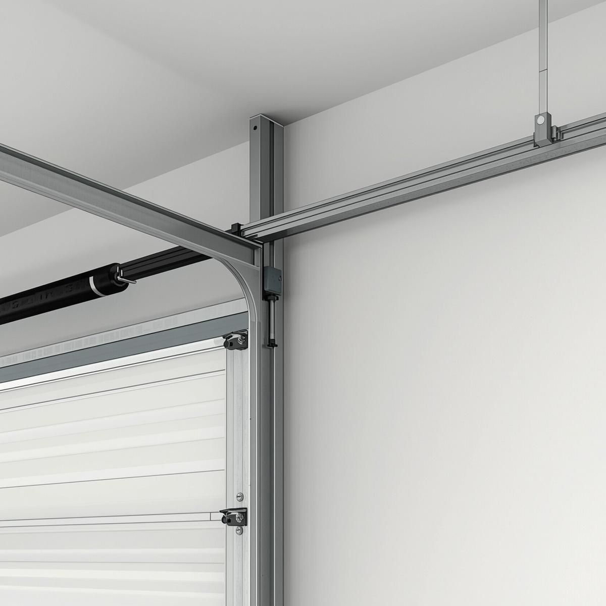 Interior view of a garage door track and opener rail on a white wall and ceiling