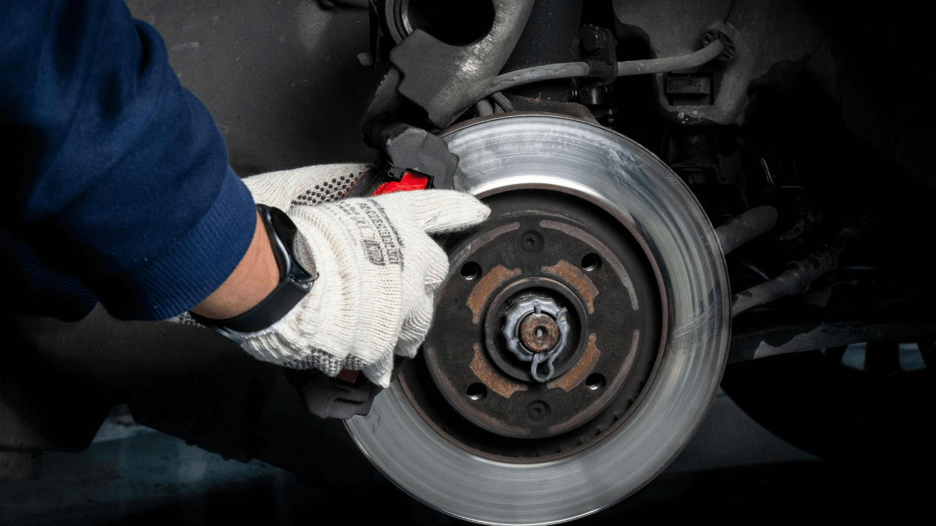 a mechanic doing a brake service