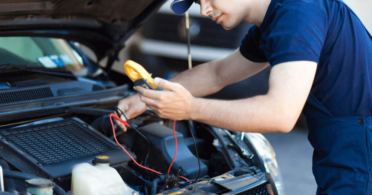 A mechanic doing an auto repair