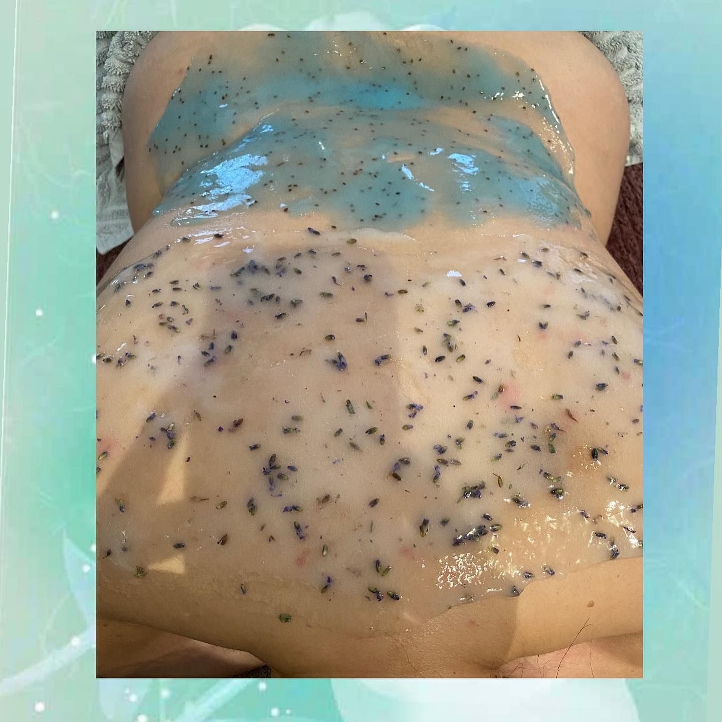 A close up of a person 's back with a blue mask on it