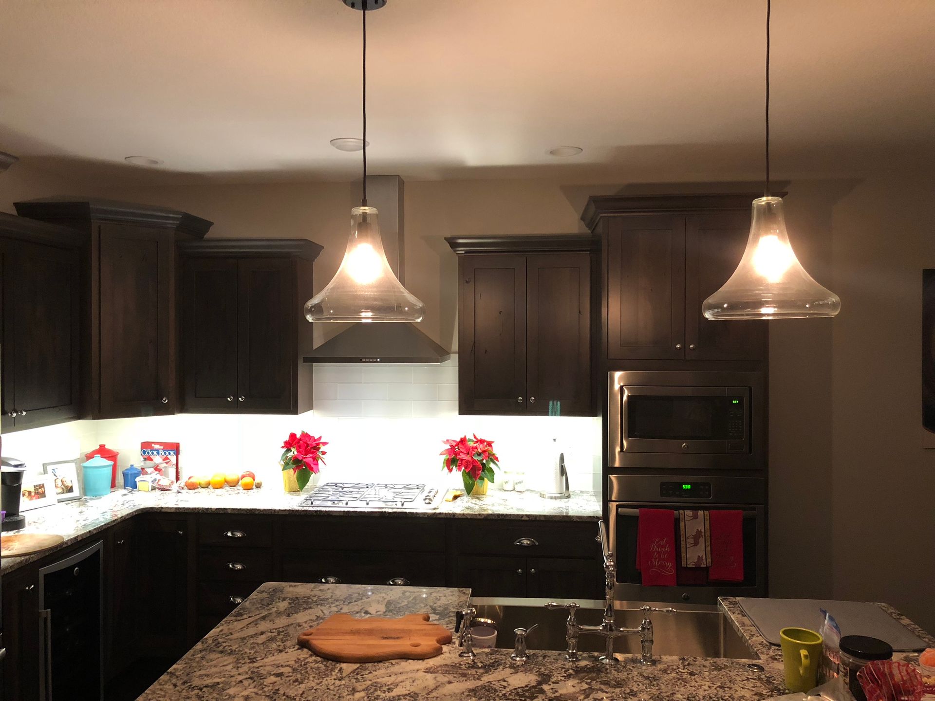 A kitchen with stainless steel appliances and granite counter tops