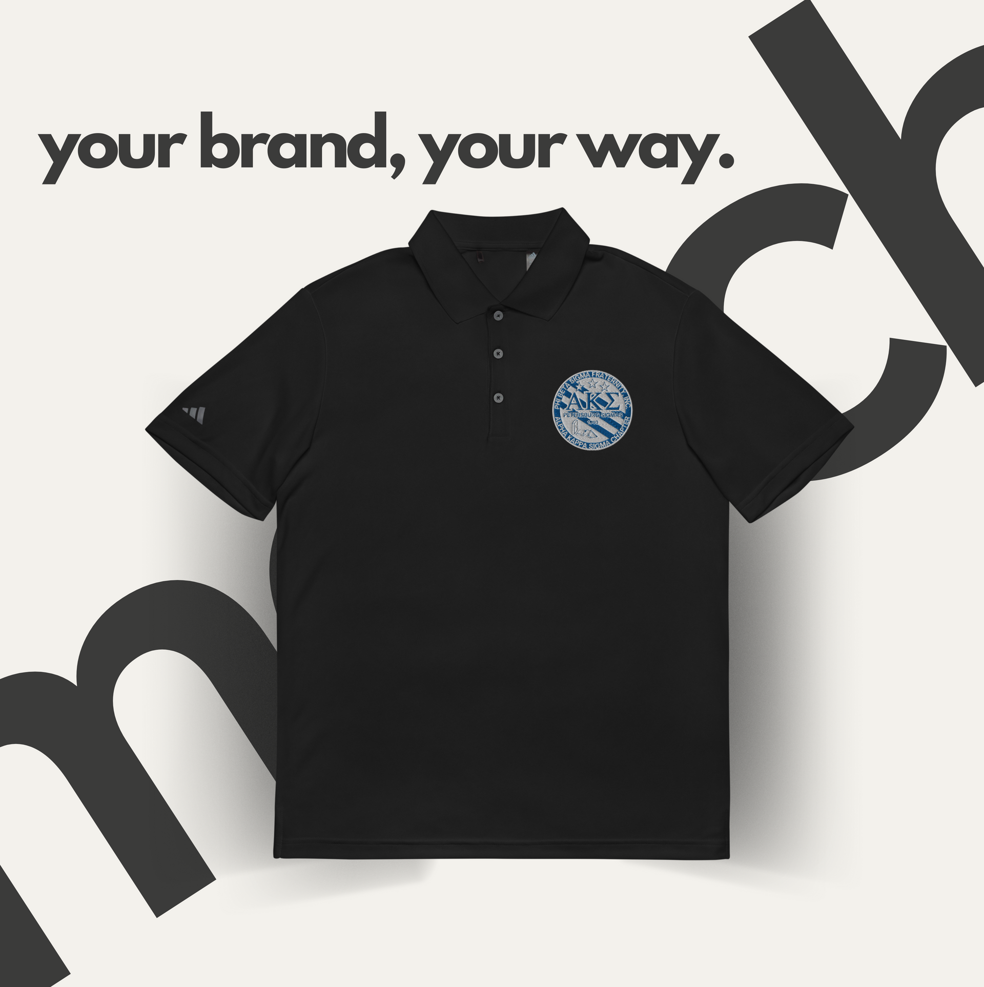 Black polo shirt with a custom logo, text overlay reads 