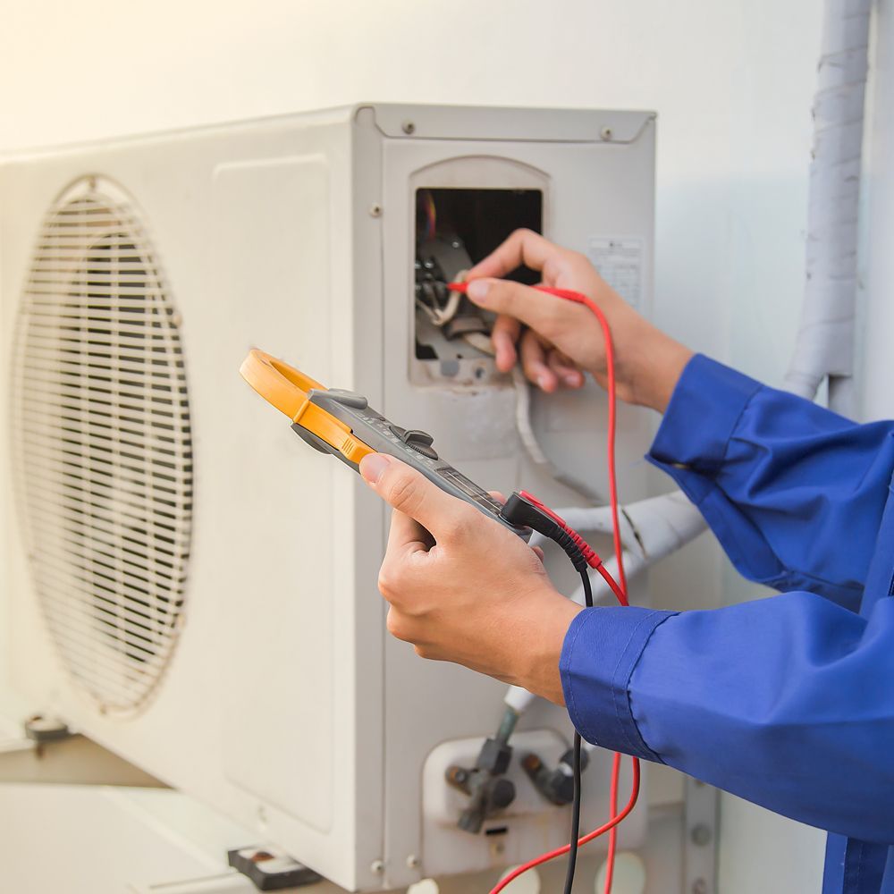 Professional Worker Repairing Air Condition Unit