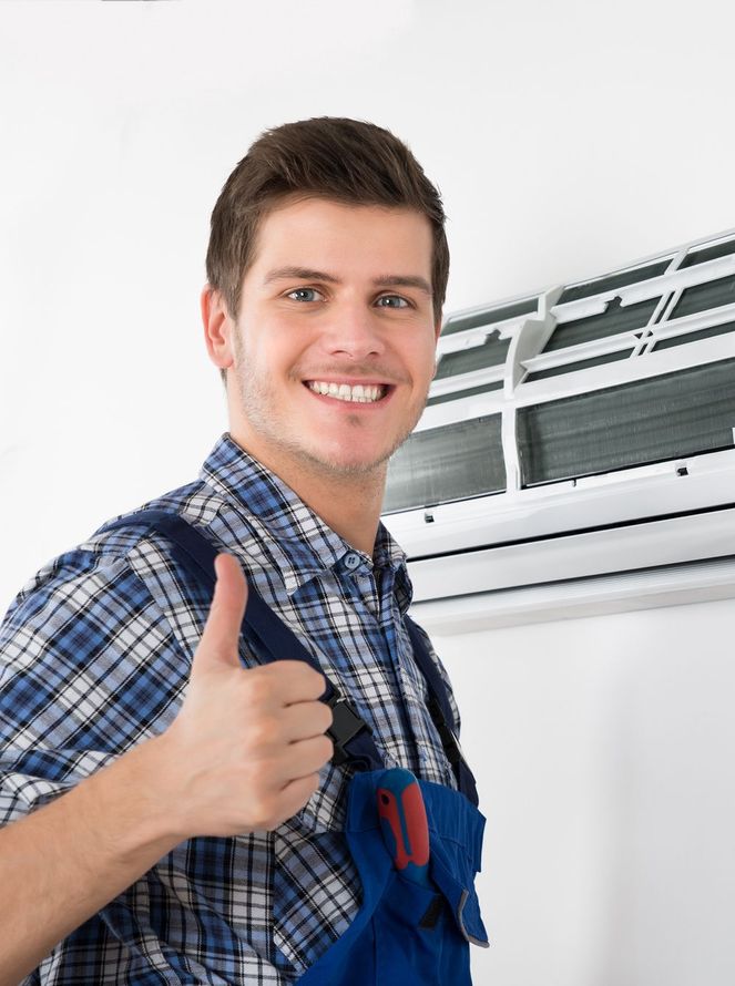 Professional Worker Showing Thumbs Up After AC Installations