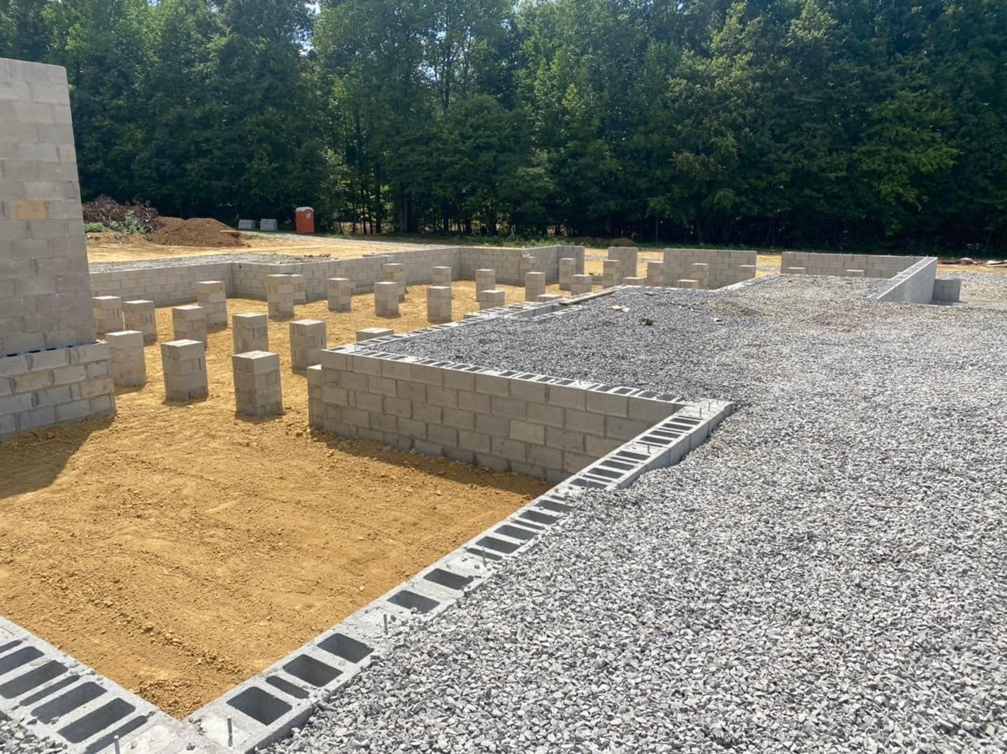 A pile of gravel and bricks on a construction site