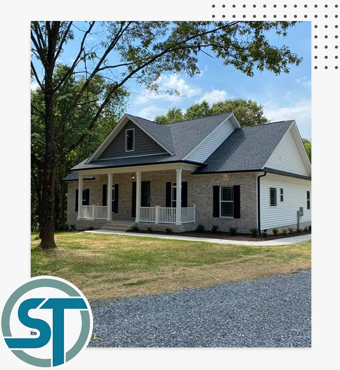 A picture of a house with a st logo in the corner