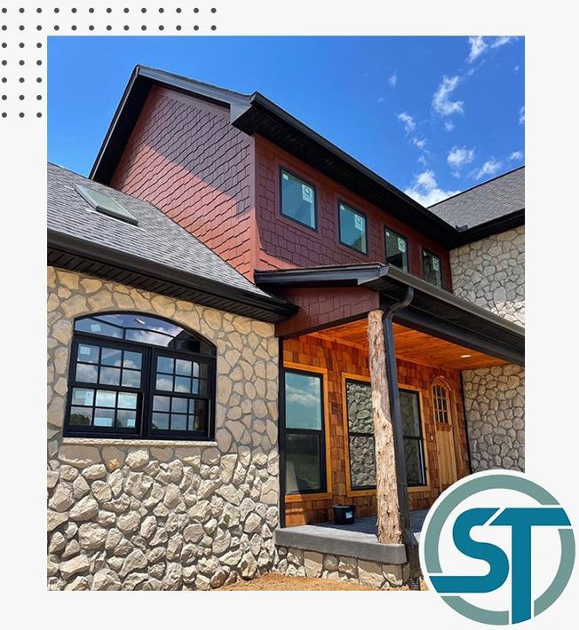 A picture of a house with a st logo in the corner