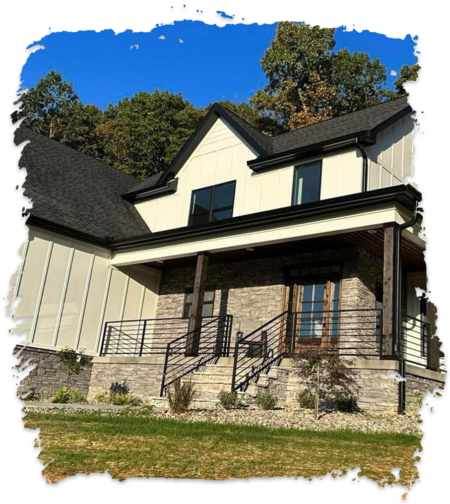 A white house with a black roof and a porch
