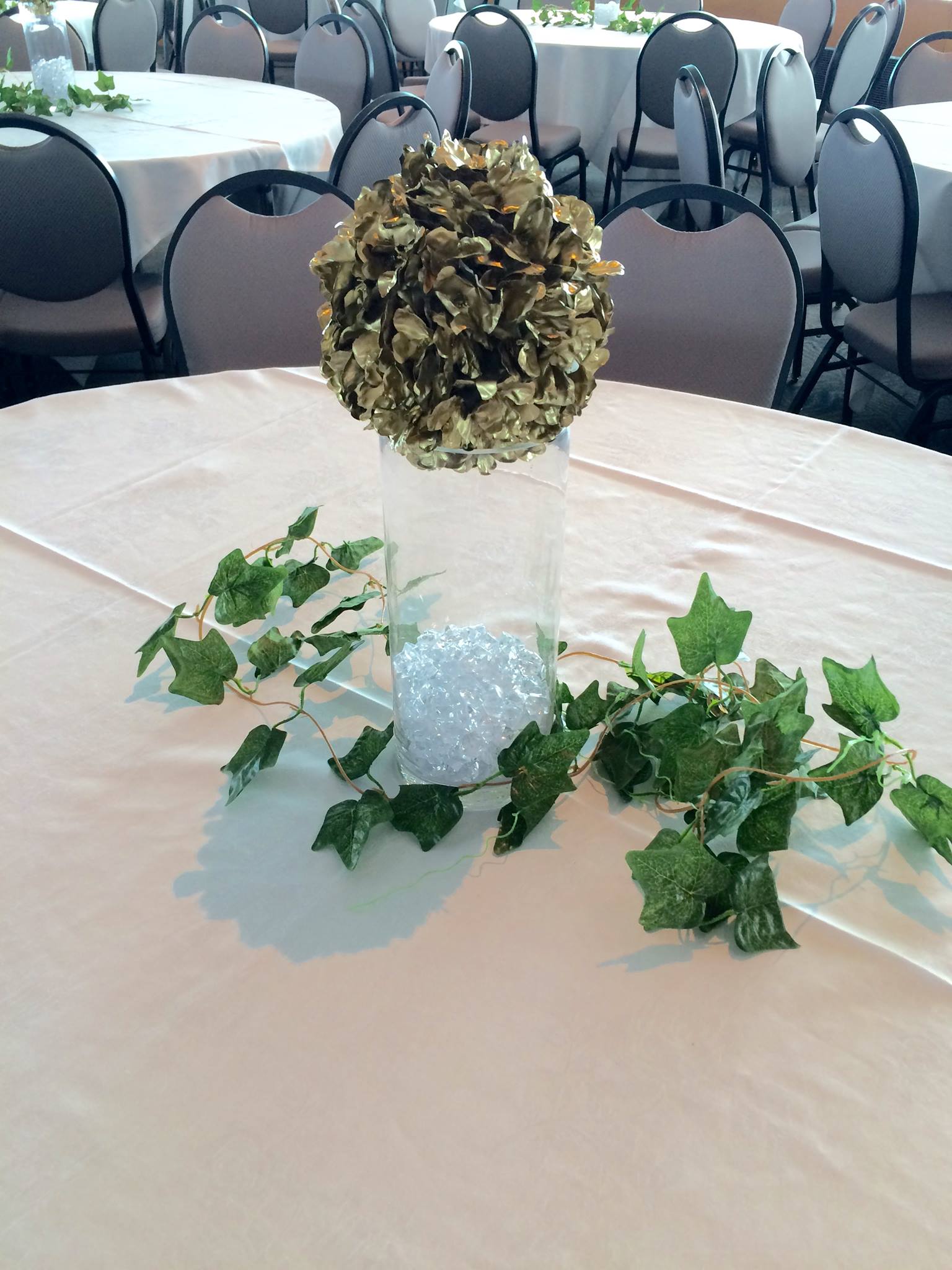 Gold flower ball and ivy garland centrepiece
