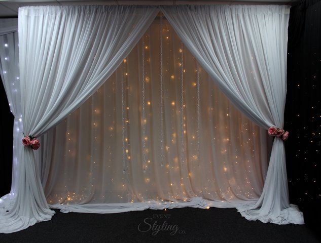 Bespoke Fairy curtain with draped front, crystal stands and pink roses.Hire price from $450 including Auckland installation