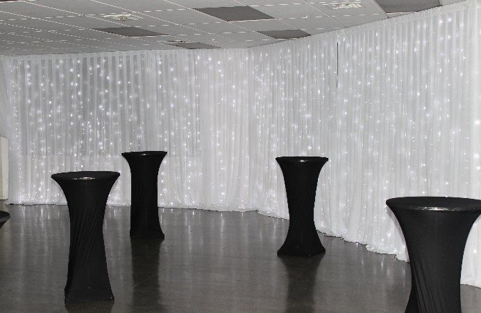 Pure white fairy light wall draping