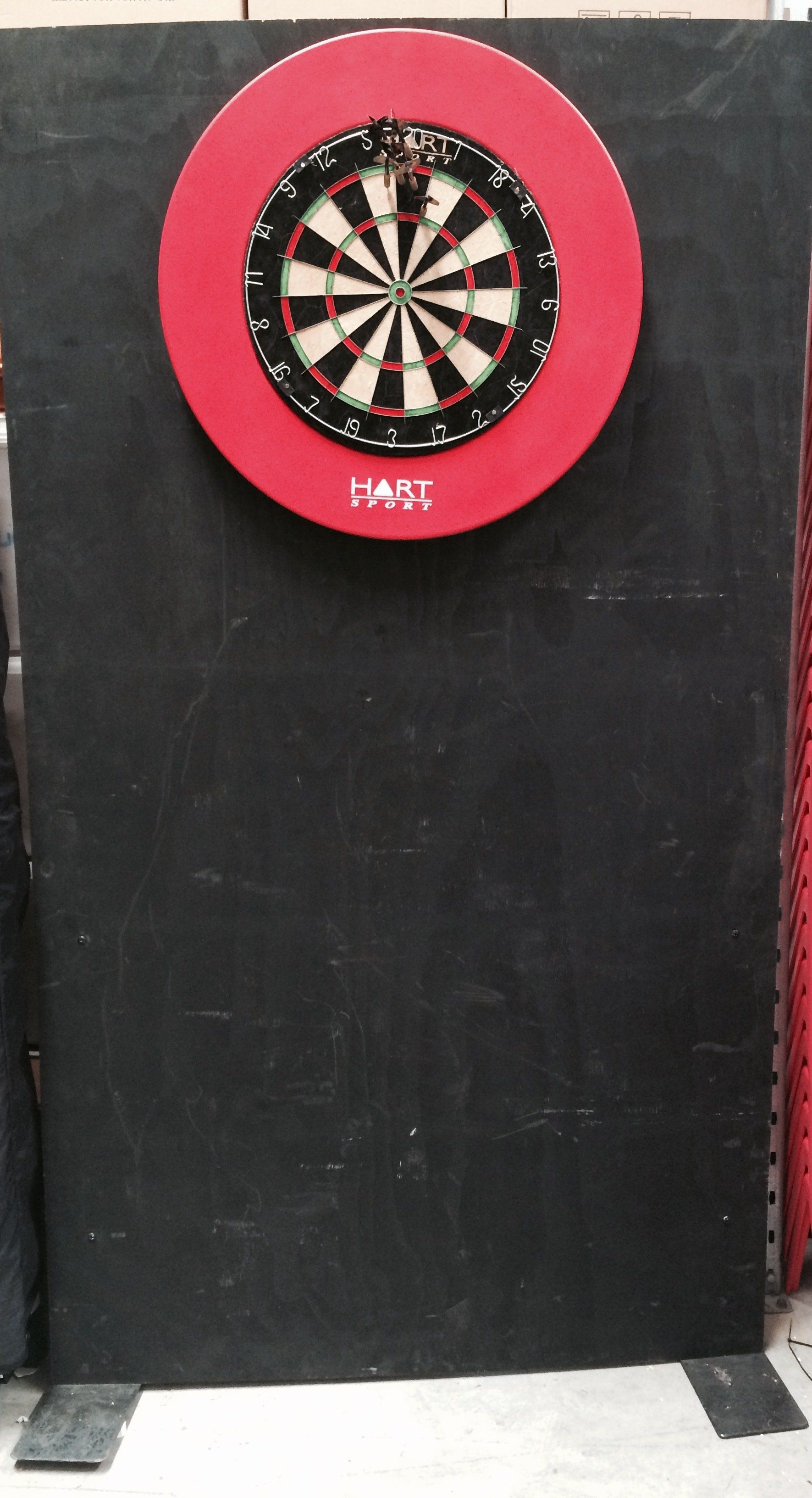 Dart board hire price $95 incl gst. Comes on a backing board and stand includes x2 sets of competition standard darts