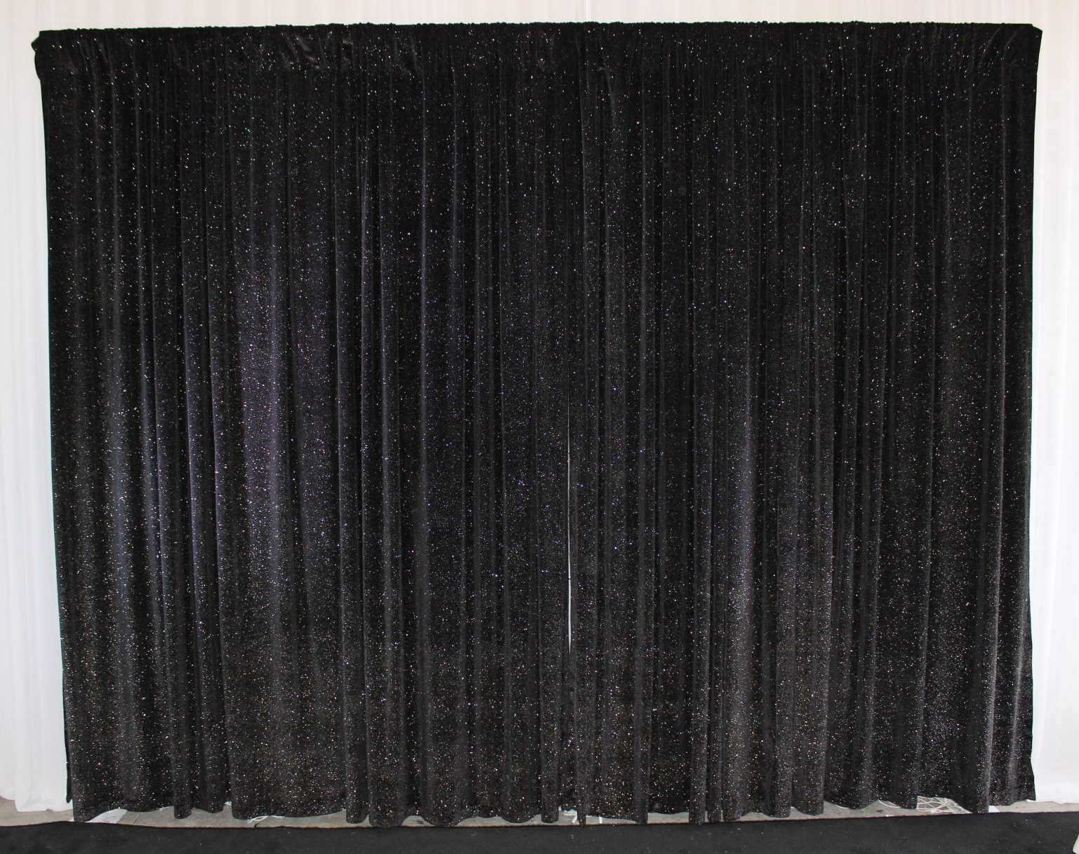 Black Sparkle wall draping 3m wide x 3m highHire price from $30 Incl frames & gst