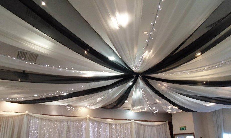 Black and white drapes with fairy lights