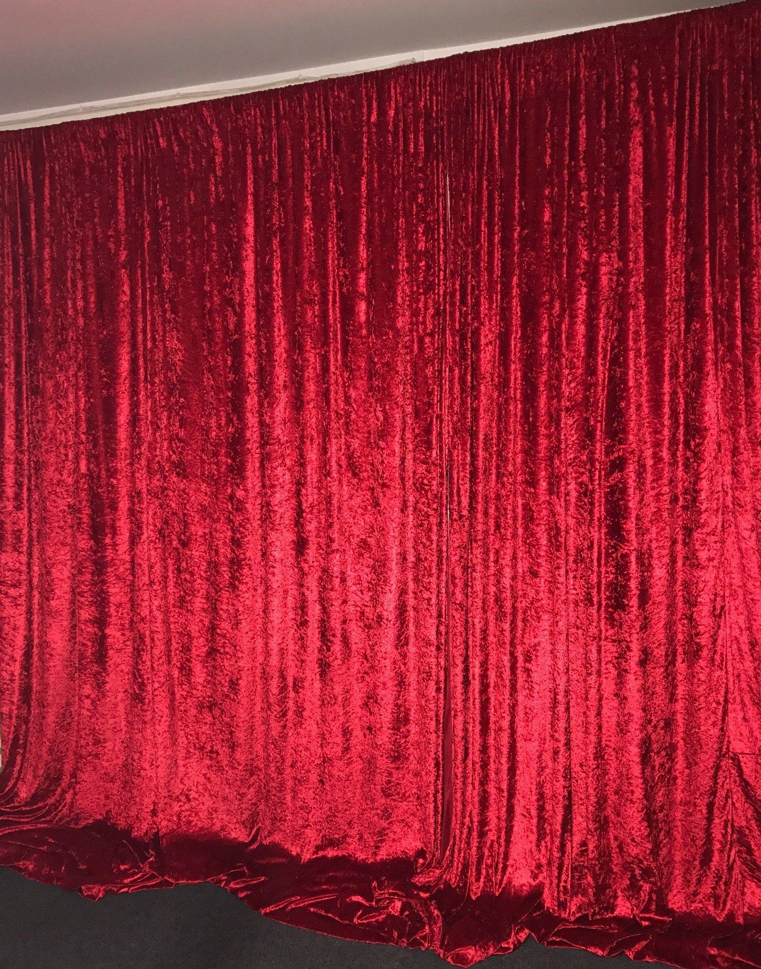 Red velvet panne wall draping