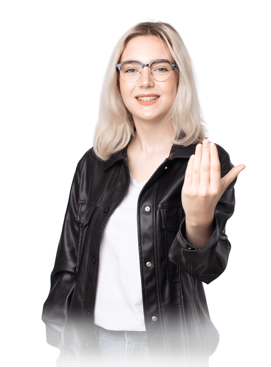 Man pointing, smiling, wearing black hoodie; arm tattoo visible.