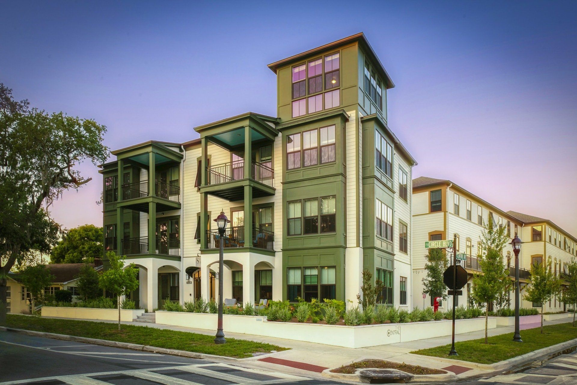 Photo showing the building, with the photo taken from the middle of the street
