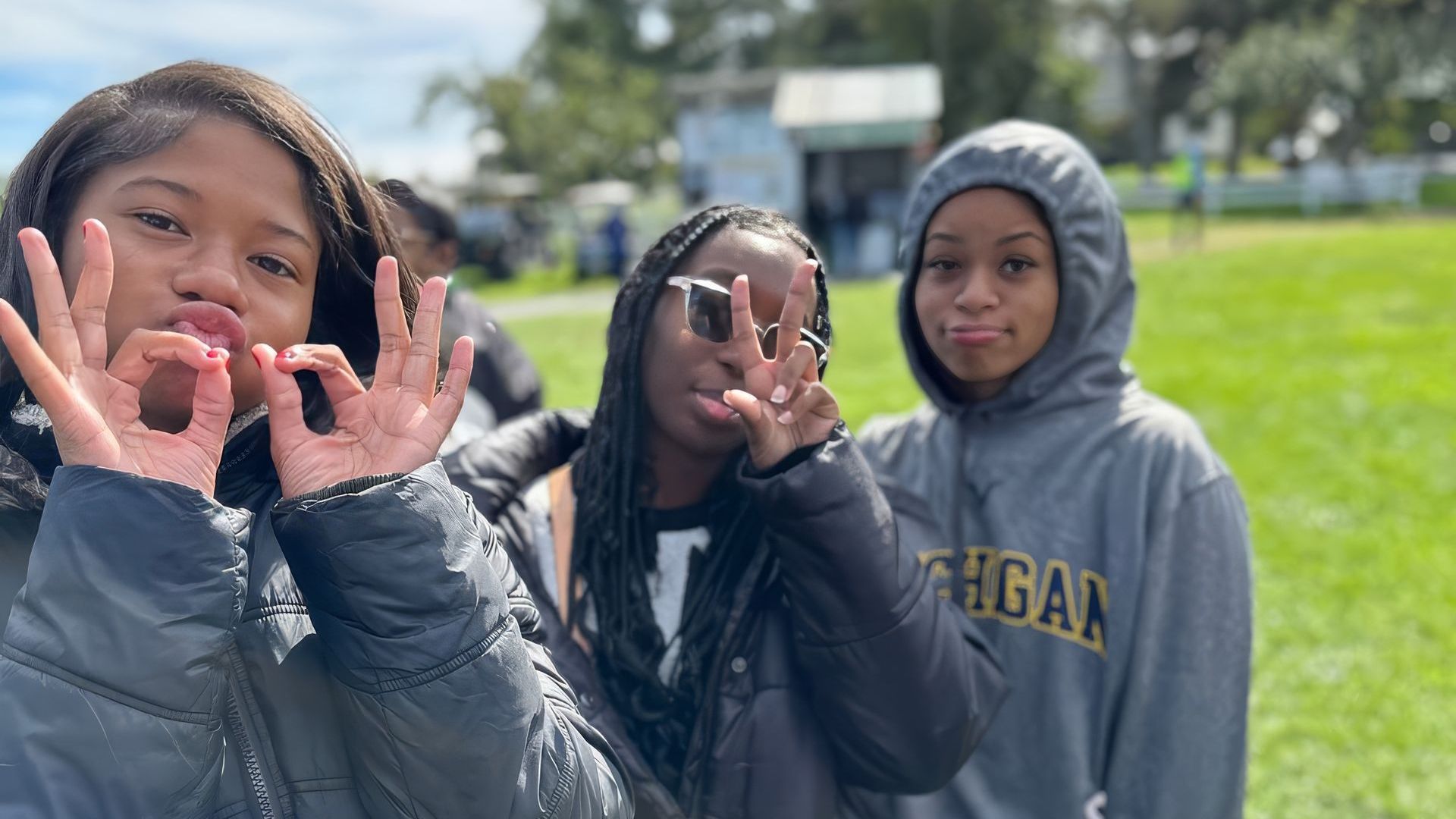 three teen girls at a youth event