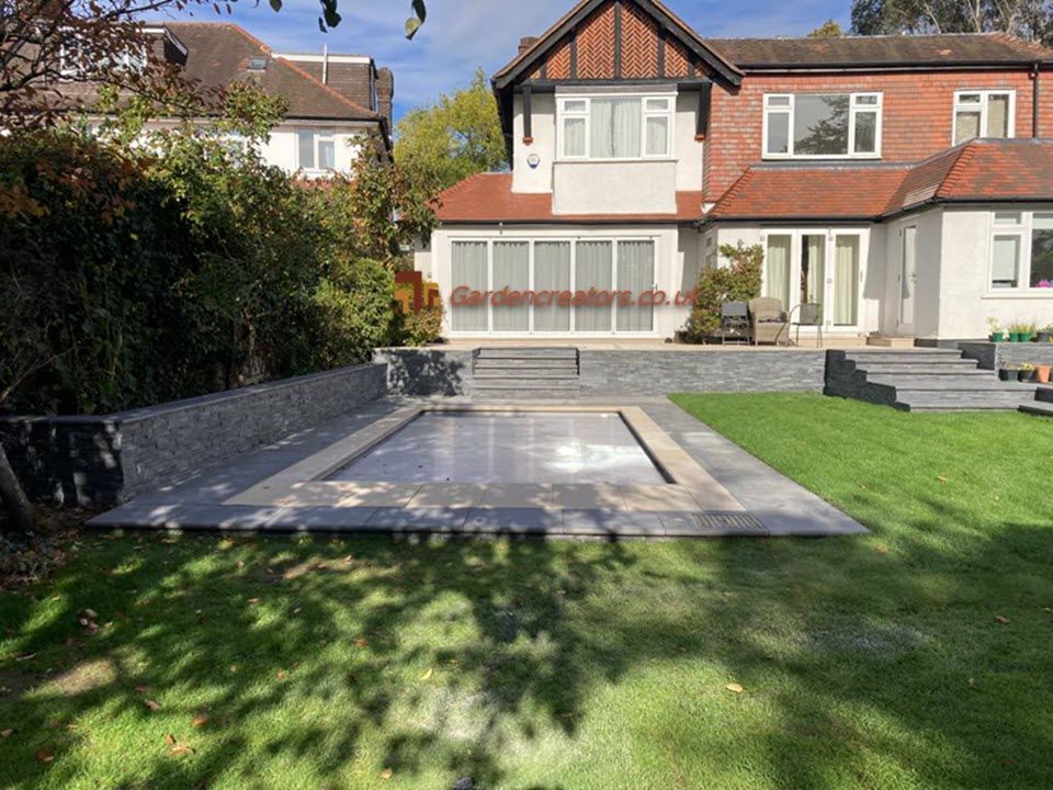 A large house with a large swimming pool in front of it