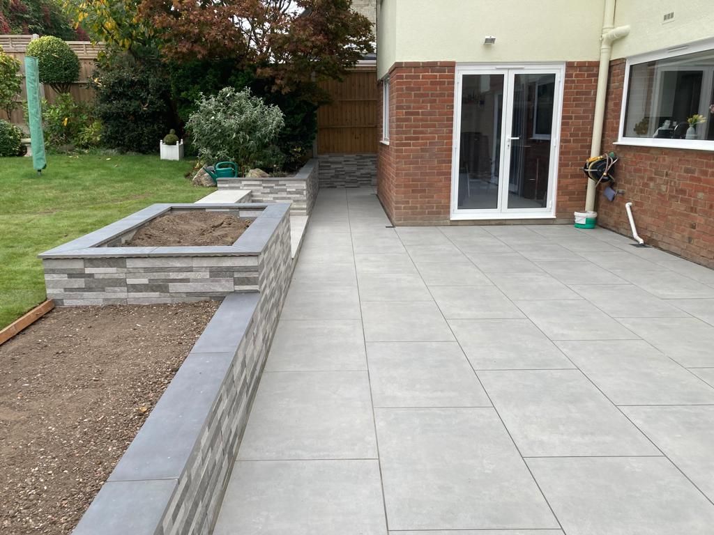 brick retaining wall and paving